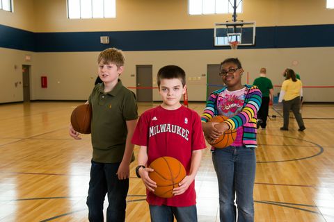 Students playing basketball